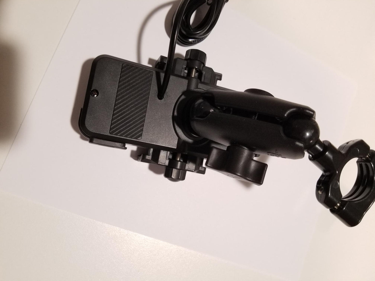 Phone mount with Inductive wireless charging with articulating ball mounting system
