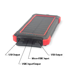 A portable power bank with a solar panel on the top, highlighted areas indicating USB and Micro USB inputs and outputs, with a red and black color scheme.